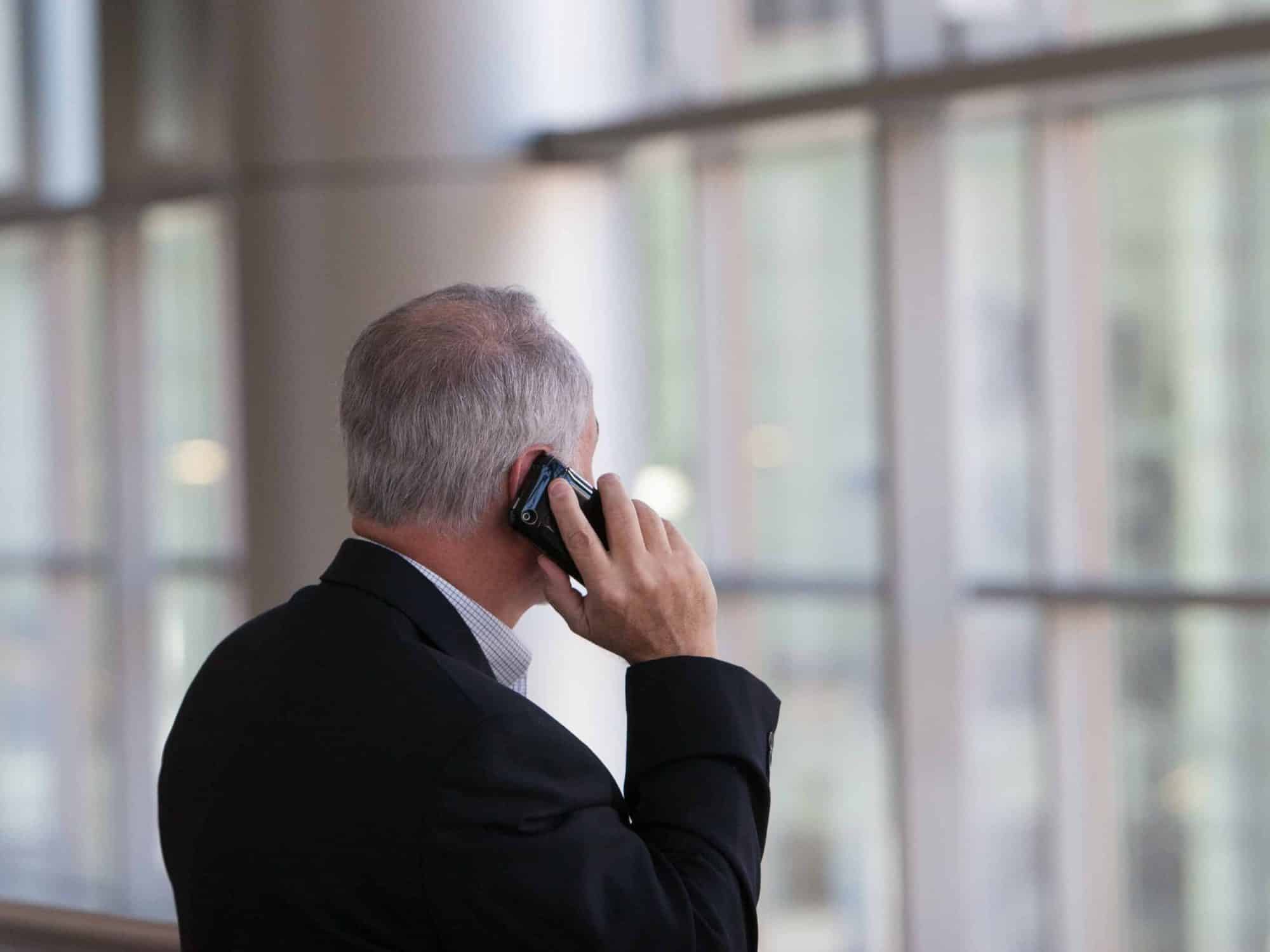 business man making a call on a mobile phone